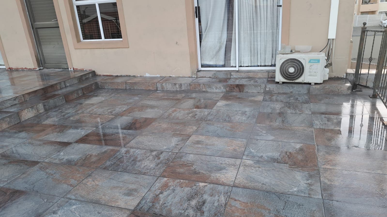 Balcony waterproofing coating being applied