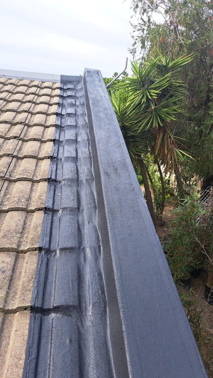 Roofing project during and after waterproofing, side by side